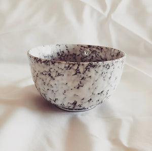 white frosted ceramic bowl candle